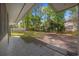 Beautiful back yard featuring a patio, a garden, and mature trees, with room to relax or entertain at 1623 27Th Ave. N, North Myrtle Beach, SC 29582