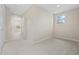 This neutral bedroom provides natural light and spacious closet space at 1623 27Th Ave. N, North Myrtle Beach, SC 29582