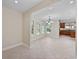 Open-concept dining area with views into the kitchen with tile floors and neutral paint at 1623 27Th Ave. N, North Myrtle Beach, SC 29582