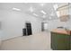 Spacious garage with bright lighting, ample workspace, and an abundance of storage options at 1623 27Th Ave. N, North Myrtle Beach, SC 29582