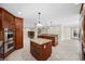 Spacious kitchen with a double oven, island, and tile flooring at 1623 27Th Ave. N, North Myrtle Beach, SC 29582