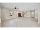 Spacious open-plan living area with fireplace and staircase at 1623 27Th Ave. N, North Myrtle Beach, SC 29582