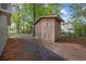 Exterior shot of the shed with natural lighting and a charming lattice design at 1623 27Th Ave. N, North Myrtle Beach, SC 29582