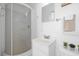 Bathroom with a corner shower, vanity, mirror, and towel rack at 1919 Spring St. # 36A, North Myrtle Beach, SC 29582