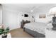 Spacious bedroom with closet and bed, featuring coastal decor and ceiling fan at 1919 Spring St. # 36A, North Myrtle Beach, SC 29582