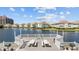 Community pier featuring seating and BBQ grills, situated on a tranquil waterfront at 1919 Spring St. # 36A, North Myrtle Beach, SC 29582