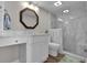 Updated bathroom with marble walk-in shower, stylish vanity, and modern fixtures at 2001 S Ocean Blvd. # 406, Myrtle Beach, SC 29577