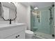 Updated bathroom with glass-enclosed walk-in shower, tiled floor, and modern sink at 2001 S Ocean Blvd. # 406, Myrtle Beach, SC 29577