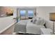 Inviting bedroom with ocean view, large-screen TV, and comfortable bed setup for relaxation at 2001 S Ocean Blvd. # 406, Myrtle Beach, SC 29577