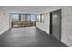 Spacious hallway with natural lighting and a peek of the beach and ocean view outside at 2001 S Ocean Blvd. # 406, Myrtle Beach, SC 29577