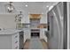Contemporary kitchen with white cabinets, stainless steel appliances, and a functional layout for cooking at 2001 S Ocean Blvd. # 406, Myrtle Beach, SC 29577