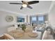 Inviting dining and living area featuring comfortable seating, coastal decor, and beautiful ocean views at 2001 S Ocean Blvd. # 406, Myrtle Beach, SC 29577