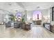 Inviting lobby area with ample seating, plants, and pool views, creating a comfortable gathering space at 2001 S Ocean Blvd. # 406, Myrtle Beach, SC 29577