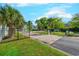 Gated community entrance with palm trees and well-maintained landscaping offers security and curb appeal at 202 Landing Rd. # B, North Myrtle Beach, SC 29582