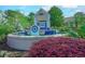The 'Waterway Landing' entrance fountain features a nautical theme and lush, colorful landscaping at 202 Landing Rd. # B, North Myrtle Beach, SC 29582