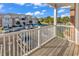View from private balcony overlooking parking area and landscaped grounds on a bright sunny day at 2037 Silvercrest Dr. # 16E, Myrtle Beach, SC 29579