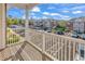 View from private balcony overlooking parking area and landscaped grounds on a bright sunny day at 2037 Silvercrest Dr. # 16E, Myrtle Beach, SC 29579