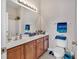 Bright bathroom featuring vanity with wood cabinets and ample counter space at 2037 Silvercrest Dr. # 16E, Myrtle Beach, SC 29579