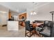Eat-in kitchen features stainless steel appliances and a stylish breakfast nook with banquette seating at 2037 Silvercrest Dr. # 16E, Myrtle Beach, SC 29579