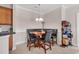 Kitchen features a breakfast nook with banquette seating and pendant lighting at 2037 Silvercrest Dr. # 16E, Myrtle Beach, SC 29579