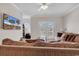 Inviting living room with plush seating and a wall-mounted TV for relaxed entertainment at 2037 Silvercrest Dr. # 16E, Myrtle Beach, SC 29579