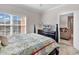 Main bedroom features a view of the living room and access to natural lighting at 2037 Silvercrest Dr. # 16E, Myrtle Beach, SC 29579