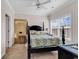 Cozy main bedroom with ceiling fan, natural light, and neutral decor for a serene ambiance at 2037 Silvercrest Dr. # 16E, Myrtle Beach, SC 29579