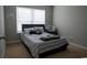 Inviting bedroom with a cozy bed, featuring a controller neon sign and a window with natural light at 2039 Chadbury Ln., Myrtle Beach, SC 29588