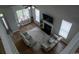 Aerial view of a living room with fireplace, two recliners, and ample natural light at 2039 Chadbury Ln., Myrtle Beach, SC 29588