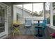 Relaxing screened porch with comfortable chairs and views of the outdoors at 2039 Chadbury Ln., Myrtle Beach, SC 29588