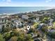 Beautiful aerial view of neighborhood with beach and ocean views at 210 16Th Ave. N, Surfside Beach, SC 29575