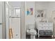 Clean bathroom with white tile, vanity, and a shower; stylish and functional at 210 16Th Ave. N, Surfside Beach, SC 29575