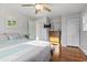 Serene bedroom with a comfortable bed, dresser, and a ceiling fan for added comfort at 210 16Th Ave. N, Surfside Beach, SC 29575