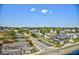 An aerial view showcasing the neighborhood, nearby houses, and parking lot at 2101 S Ocean Blvd. S # B-6, North Myrtle Beach, SC 29582