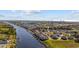 Lovely aerial view of waterfront condos along the waterway near a pool and parking area at 214 Landing Rd. # I, North Myrtle Beach, SC 29582