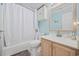 Bathroom featuring a toilet, shower, vanity, and mermaid art at 214 Landing Rd. # I, North Myrtle Beach, SC 29582