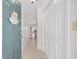 Bright entryway features tile flooring, coat closet, and 