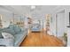 Living room featuring hardwood flooring and light blue couches at 214 Landing Rd. # I, North Myrtle Beach, SC 29582
