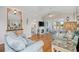 Bright living room with hardwood floors, nice furniture, and a patio view at 214 Landing Rd. # I, North Myrtle Beach, SC 29582