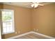 Bedroom featuring new flooring, natural light from a large window and a ceiling fan at 2429 Westbrook Dr., Conway, SC 29527