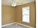 A bright bedroom featuring a ceiling fan, natural light and updated flooring at 2429 Westbrook Dr., Conway, SC 29527