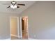 Large living room with ceiling fan, neutral paint, and new laminate flooring at 2429 Westbrook Dr., Conway, SC 29527