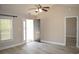 Bright living room with neutral walls, updated flooring, and a ceiling fan at 2429 Westbrook Dr., Conway, SC 29527