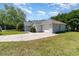 Well-maintained house featuring a two-car garage and a concrete driveway at 2654 Wild Game Trail, Myrtle Beach, SC 29588