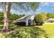 Side exterior showcasing well-maintained landscaping and the home's architectural details at 2654 Wild Game Trail, Myrtle Beach, SC 29588