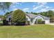 Charming single-story home with a well-manicured lawn, lush landscaping, and inviting curb appeal at 2654 Wild Game Trail, Myrtle Beach, SC 29588