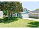Charming home featuring a manicured lawn, two car garage and mature landscaping at 2705 South Key Largo Circle, Myrtle Beach, SC 29577