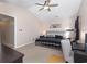 A spacious bedroom with a vaulted ceiling, a ceiling fan, and a comfortable bed with a metal frame at 3012 Sabal Ct., Murrells Inlet, SC 29576