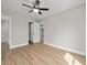 Bedroom with a ceiling fan, neutral color palette and en suite bathroom access at 3415 B And S Rd., Loris, SC 29569