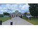 Ripken Experience baseball field with a green-roofed building, trees, and flag at 342 Red Fox Rd., Myrtle Beach, SC 29579